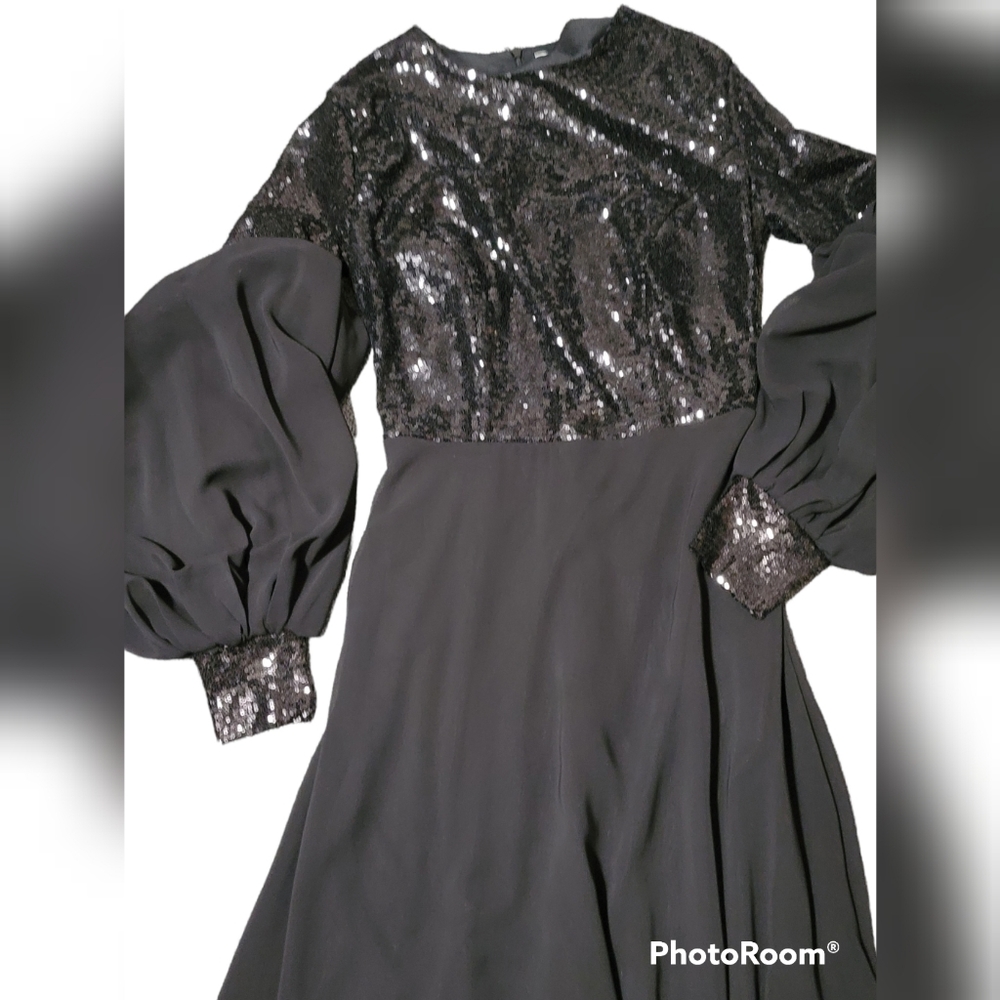 Brand new long black dress size XS